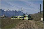 The TPC AOMC / ASD Beh 2/6 542 ‘La Forteresse’ is travelling from Aigle to Les Diablerets as R71 440 and can be seen in the vineyards above Aigle. On the left of the picture, the castle of Aigle can be seen in the background. Although the Beh 2/6 N° 541 - 547 have been able to run on the ASD since they were put into service by TPC, they are rarely seen here.

9 February 2026
