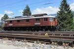 BLS battleship 205 running round in Frutigen on a sunny 30 June 2013.