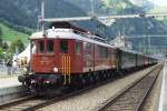 BLS 205 with a shuttle train to Kandersteg is about to leave Frutigen on 30 June 2013.