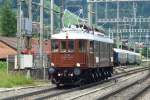 BLS 208 approaches an extra train at Frutigen on 30 June 2013.