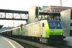 Scanned picture of BLS 485 003 with automotives at Spiez on 19 May 2006.