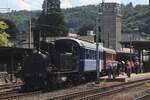 Former Jura-Simplon Bahn JS-35 hauls a colourful extra train out of Burgdorf on 17 May 2025.