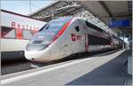 The TGV Lyria Rame 4718 from Paris Gare de Lyon (via Dijon), which was decorated with Olympic advertising, reached Lausanne on platform 4 and was therefore extremely awkward for taking photos.