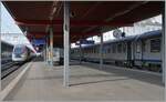 SNCF ambience on the platform in Geneva with Corail carriages and TGV Lyria from Paris Gare de Lyon to Lausanne.