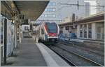 The SBB LEX RABe 522 020 comming from Coppet is arriving at the Annecy Station.