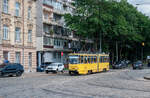 Tatra KT4D tram No.1154 turns from Dmytro Vitovskoho Street to Akademika Sakharova Street. Taken on August 1, 2023.