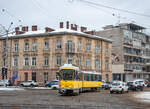 Tatra KT4DM tram No.1196 turns from Dmytro Vitovskoho Street to Akademika Sakharova Street. Taken on November 29, 2023.