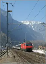 The SBB Re 460 061-5 is arriving with an IR at Martigny Station.
05.03.2011