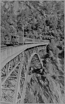 BLS Re 4/4 with the EC  Vauban  on the Bietschtal Bridge. 
scanned negative/October 1994