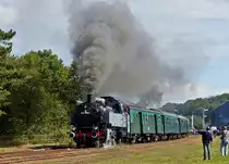 . The steam engine 64 250 of the heritage railway CFV3V (Chemin de Fer � Vapeur des 3 Vall�es) is leaving the station of Treignes on September 27th, 2014.