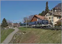 The MOB Ge 4/4 8001 wiht a Pamoramic Express on the way from Zweisimmen to Montreux by Planchamp.

15.03.2020