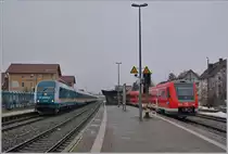 In Immenstaad waiting a V 223 with his  Alex  to Lindau und a VT 612 to Kempten his Departure times. 

15.03.2019