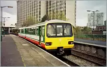 143 606 to Barry Island is leaving Cardiff Queen Street Station. 
November 2000  
(Analog Picture from CD)